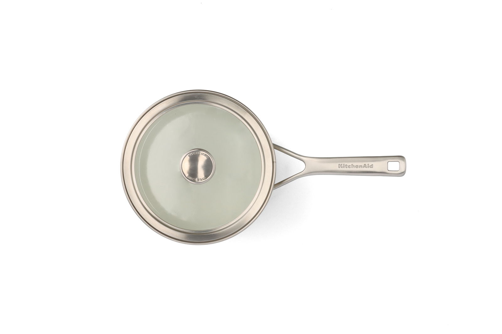 Top-Ansicht eines Kochtopfs mit Glasdeckel und Edelstahlgriff, Teil eines 4-teiligen Topfsets in der Farbe almond white.