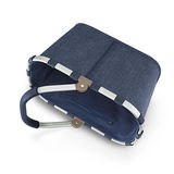 Carrybag in Dunkelblau mit Fischgrätenmuster, seitliche Perspektive, zeigt den stabilen Aluminiumrahmen und den Tragegriff.