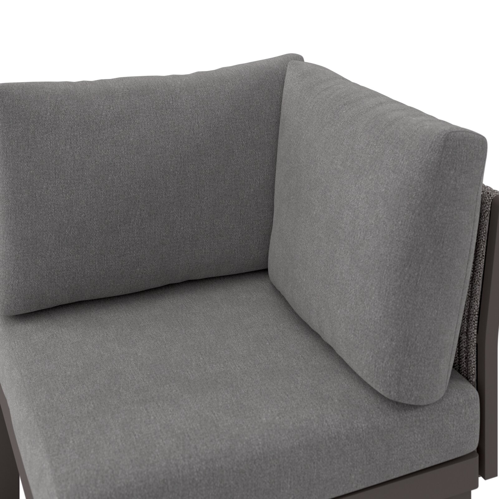 Grauer Sessel mit weichen Polstern, Nahaufnahme von der Seite
