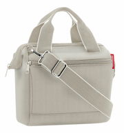 Beige Tasche mit Herringbone-Muster, verstellbarem Schultergurt und zwei Tragegriffen, seitliche Perspektive