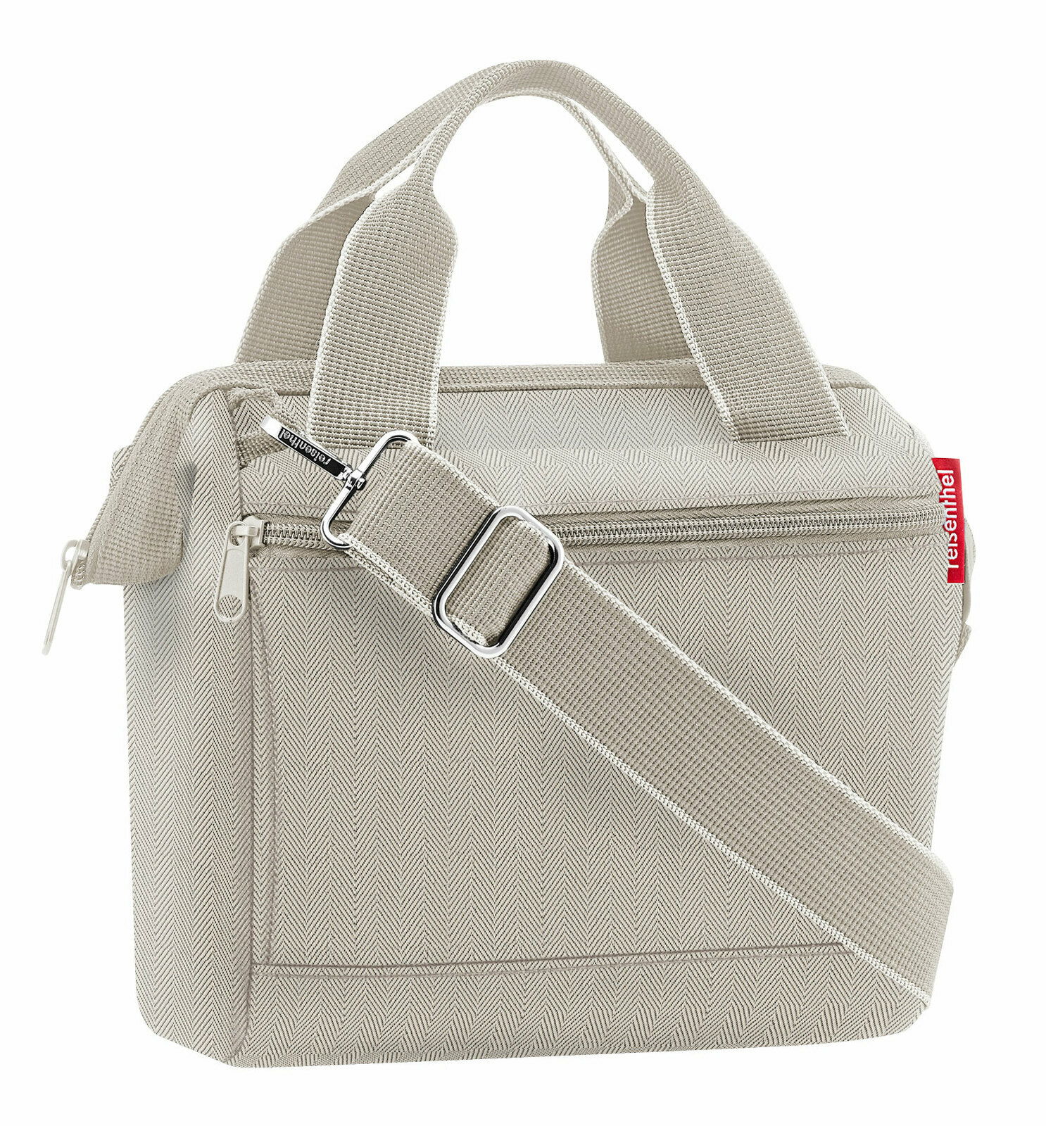 Beige Tasche mit Herringbone-Muster, verstellbarem Schultergurt und zwei Tragegriffen, seitliche Perspektive