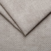 Nahaufnahme eines beigen, strukturierten Stoffes in diagonaler Perspektive, verwendet für ein Polsterbettgestell.