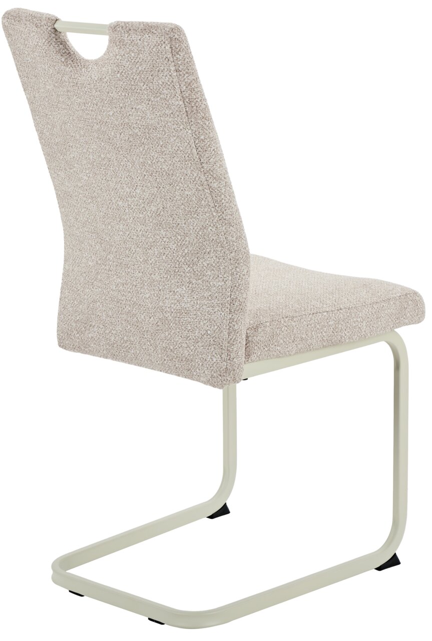 Rückansicht eines beige gepolsterten Schwingstuhls mit Metallgestell.