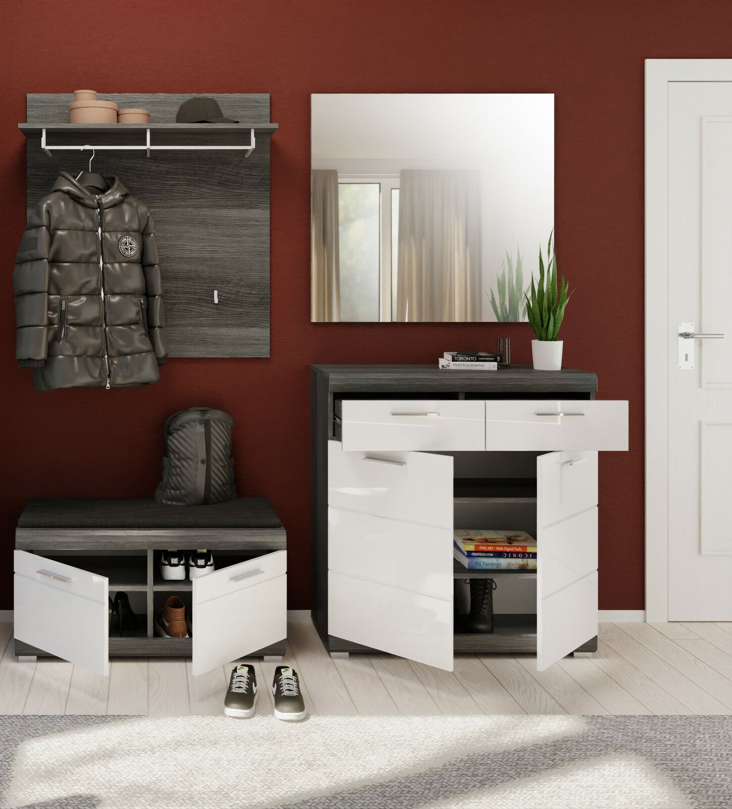 Moderner Eingangsbereich mit Garderoben-Set, bestehend aus Schuhschrank, Garderobenschrank, Spiegel und Garderobenbank in dunklem Holz und weißen Fronten, frontal betrachtet.