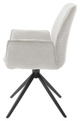 Seitenansicht eines modernen Armlehnstuhls mit hellem Stoffbezug und schwarzem Metallgestell.