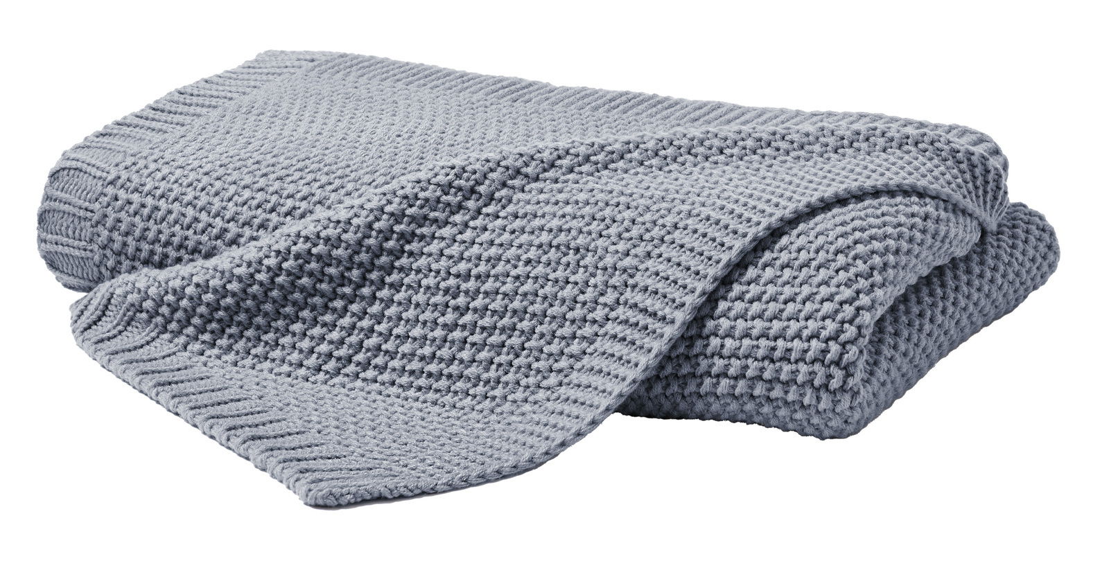 Graue Strickdecke 130x170 cm aus der Zurbrüggen Decken-Serie, gefaltet und aus seitlicher Perspektive fotografiert.