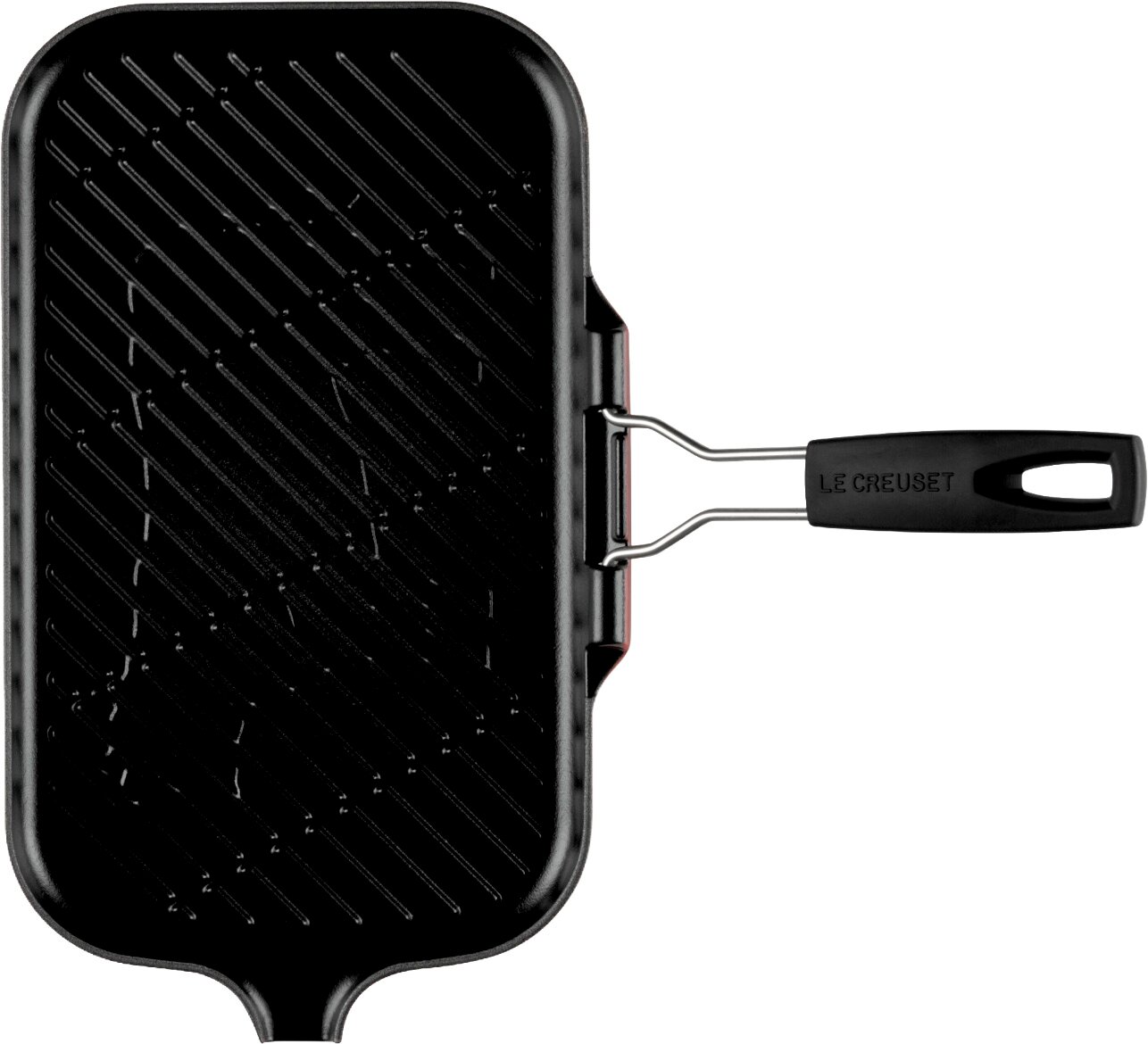Zwarte Le Creuset grillpan met geribbelde bakplaat en handvat, bovenaanzicht (van boven gefotografeerd) op witte achtergrond