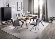 Esszimmer mit modernem Tisch und sechs grauen Stühlen, seitliche Perspektive