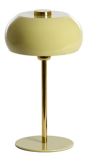 Elegante Tischleuchte mit rundem, gelbem Schirm und goldenem Standfuß, seitliche Perspektive.