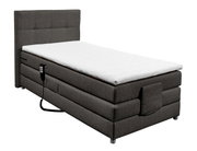 Boxspringbett in seitlicher Perspektive mit grauem Stoffbezug und weißer Matratze, inklusive Fernbedienung.