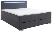 Grijs boxbed met ledverlichting in het hoofdeinde, zijaanzicht