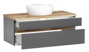 Waschtisch-Set mit grauen Schubladen und Holzplatte, darauf ein weißes Aufsatzwaschbecken, seitliche Perspektive