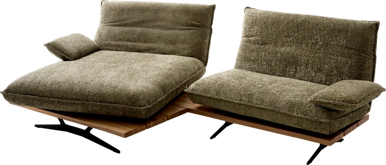 Twee modulaire loungefauteuils/chaise longue-elementen met olijfgroene bouclé-bekleding, houten sokkel en zwarte metalen poten, elk met rugleuning en armkussens, in schuin vooraanzicht afgebeeld tegen een witte achtergrond