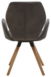 Rückansicht eines Armlehnenstuhls mit dunklem Polster und Holzbeinen