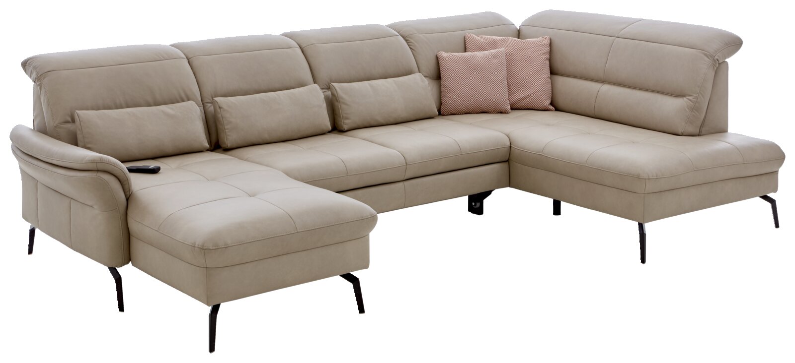 Beige Polsterrundecke in L-Form mit schwarzen Beinen, zwei rosa Kissen und einer Fernbedienung, seitliche Perspektive