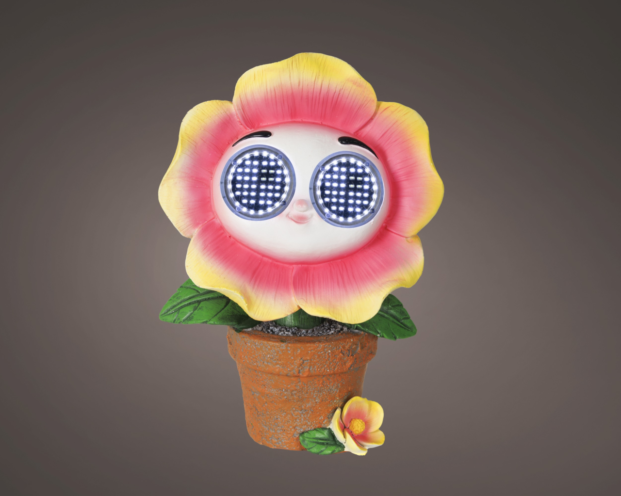 Niedliche Solarfigur in Form einer Blume mit großen leuchtenden Augen, in einem Blumentopf, Frontalansicht
