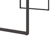 Close-up van een metalen frame van een salontafel, gezien vanaf de zijkant