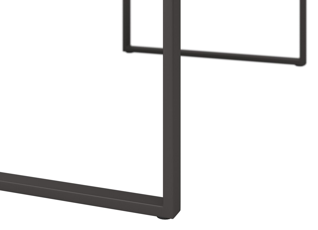 Close-up van een metalen frame van een salontafel, gezien vanaf de zijkant