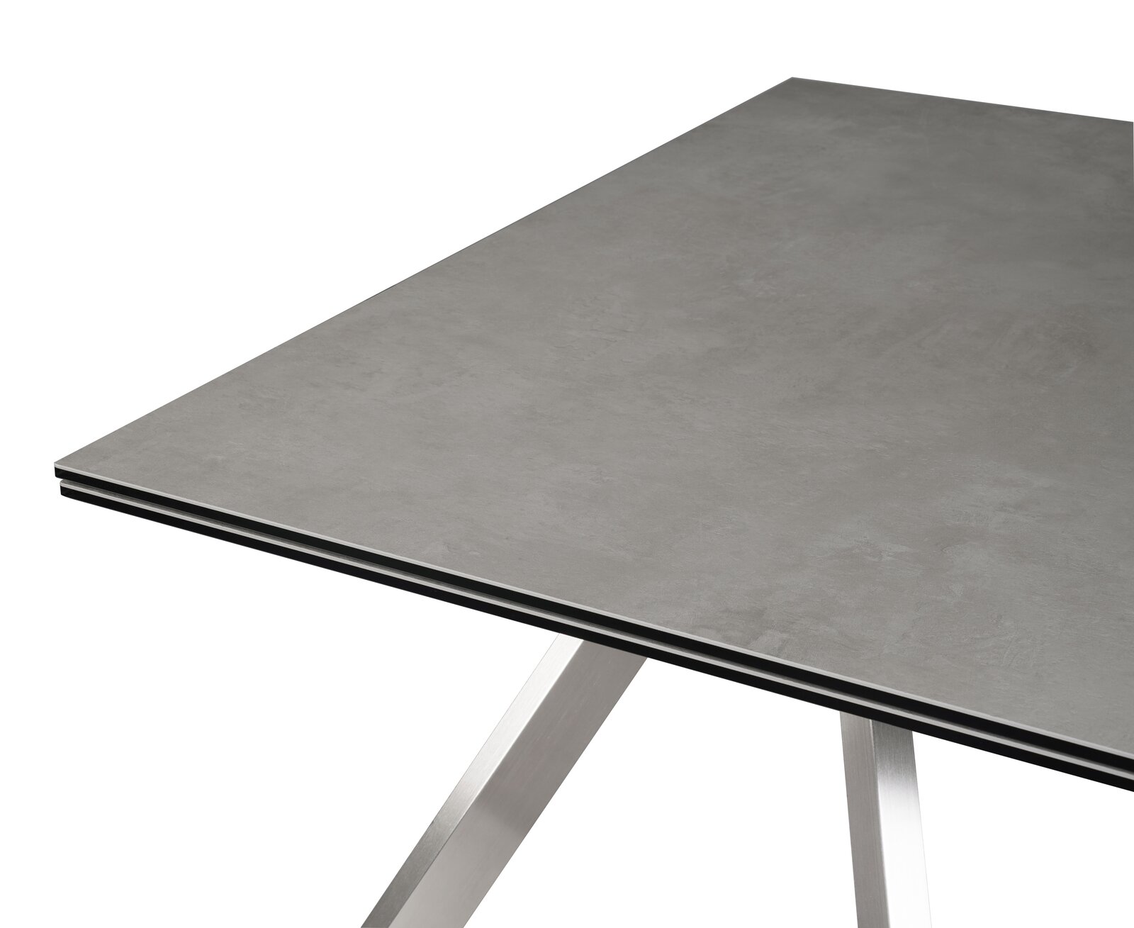 Moderner Esstisch mit grauer Tischplatte und Metallgestell, Perspektive von oben.