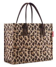 Leopardenmuster-Einkaufstasche mit braunen Henkeln, seitliche Perspektive