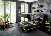 Boxspringbett CATANIA in modernem Schlafzimmer mit Stauraumfunktion, seitliche Perspektive