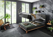 Boxspringbett CATANIA in modernem Schlafzimmer mit Stauraumfunktion, seitliche Perspektive