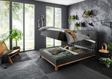 Boxspringbett CATANIA in modernem Schlafzimmer mit Stauraumfunktion, seitliche Perspektive