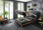 Boxspringbett CATANIA in modernem Schlafzimmer mit Stauraumfunktion, seitliche Perspektive