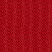 Nahaufnahme eines roten, strukturierten Stoffes mit gleichmäßigem Muster