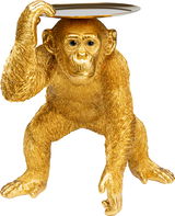 Goldene Deko-Figur eines Schimpansen in Butler-Pose, frontal betrachtet, mit einem Tablett auf dem Kopf.