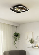 Moderne Deckenleuchte TIRIOLO in quadratischer Form mit schwarzem Rahmen und integriertem LED-Licht, von unten betrachtet.