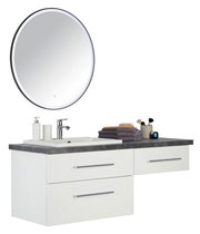 Moderne Badkombination mit rundem Spiegel, Waschbecken und Stauraum, seitliche Perspektive