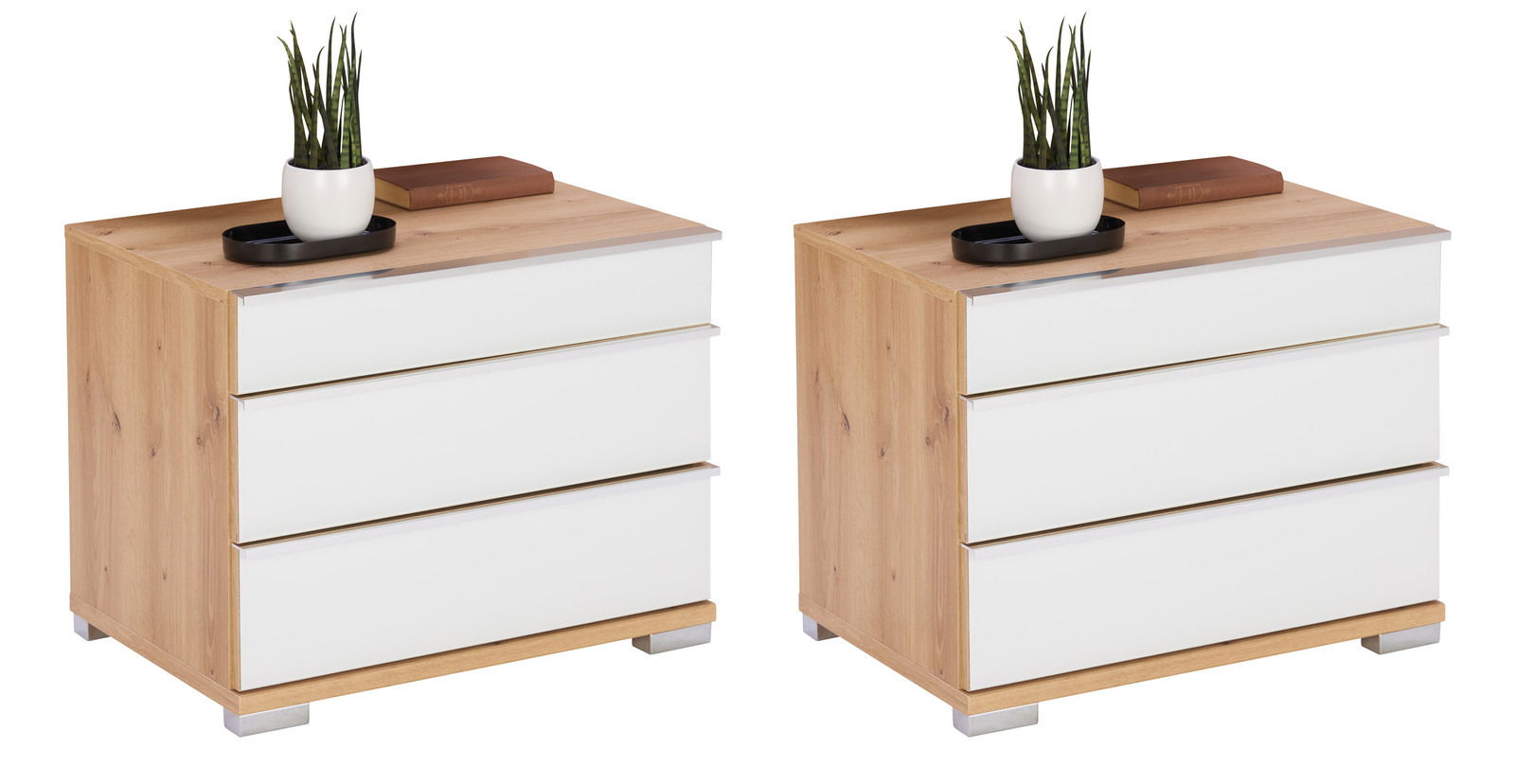 Venda Nachtschrank-Set LOFT Zwei Nachtschränke aus Holz mit drei weißen Schubladen, dekoriert mit einer Pflanze und einem Buch, seitliche Perspektive.