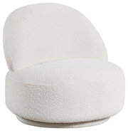 Weißer, moderner Sessel JANINA mit runder Form, aus seitlicher Perspektive fotografiert.