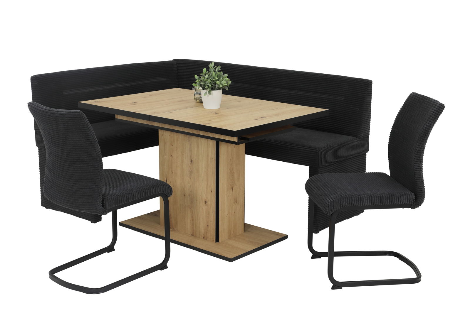 Essgruppe mit Eckbank und zwei Schwingstühlen in schwarzem Stoff, kombiniert mit einem Holztisch. Perspektive: seitliche Ansicht.