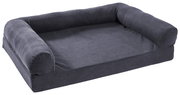 Großes, graues Hundebett mit erhöhtem Rand, aus seitlicher Perspektive fotografiert.