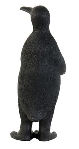 Rückansicht einer schwarzen Pinguinfigur, die als Tischleuchte verwendet wird.