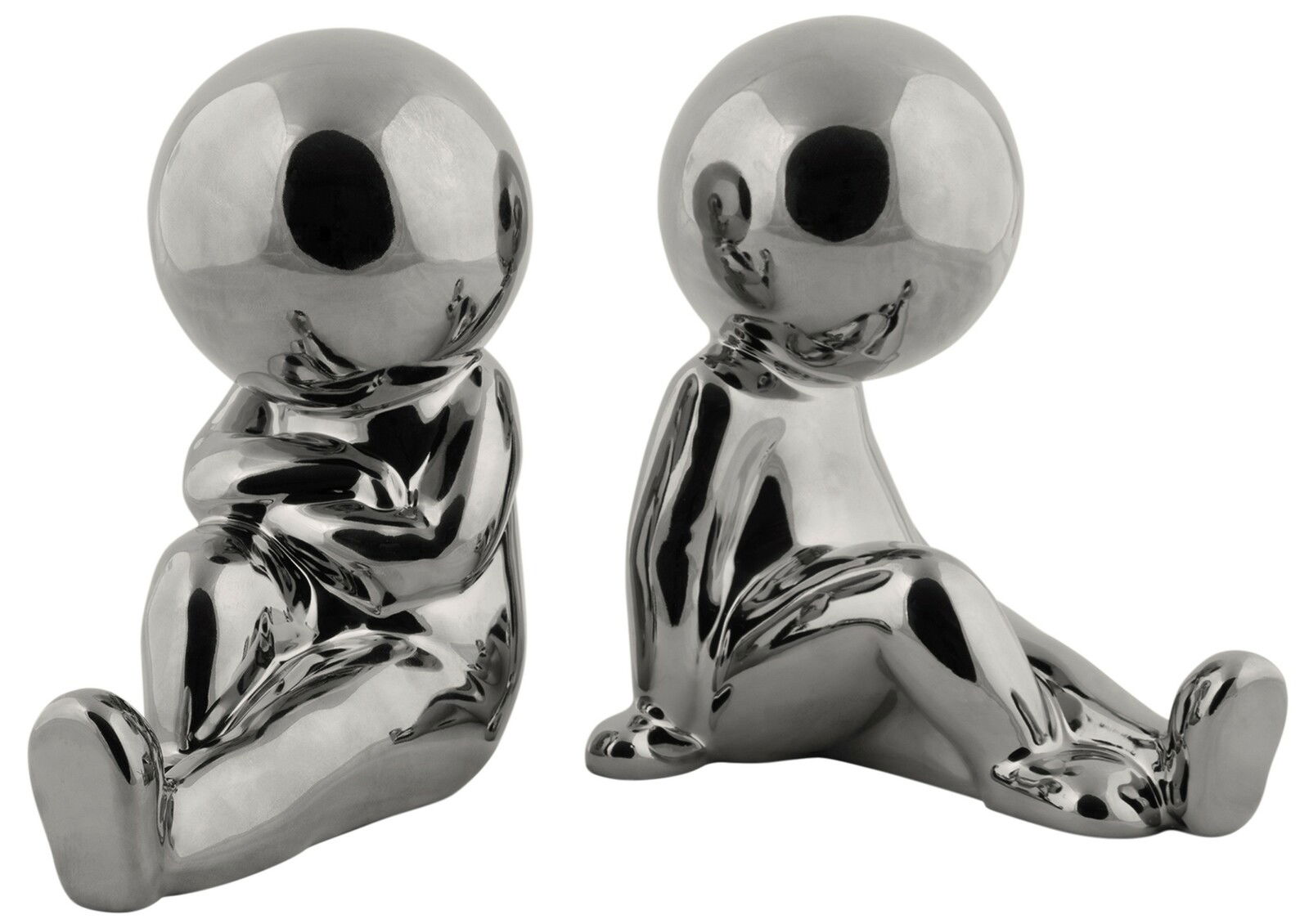 Zwei silberne, glänzende Buchstützen in Form von stilisierten, sitzenden Figuren. Die Figuren sind aus einer frontalen Perspektive zu sehen.