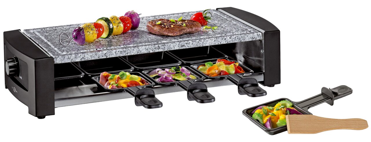 Raclette-Grill mit Natursteinplatte, vier Pfännchen mit Gemüse und Fleisch, seitliche Perspektive