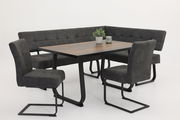 Essgruppe mit modernem Esstisch und gepolsterten Stühlen in dunklem Design, seitliche Perspektive