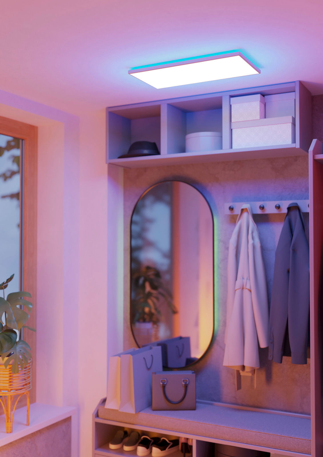 LED-Deckenleuchte ROVITO-Z in einem modernen Flur, von unten betrachtet, mit sanfter, farbiger Beleuchtung.