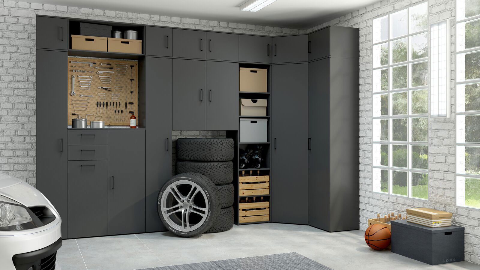 Carryhome Kommode MULTISTAURAUM Moderne graue Garagenmöbel mit mehreren Schränken und Regalen, seitliche Perspektive.