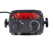 Ansicht von oben auf einen Keramik Heizlüfter mit zwei Drehreglern und einem Griff, schwarz und rot.