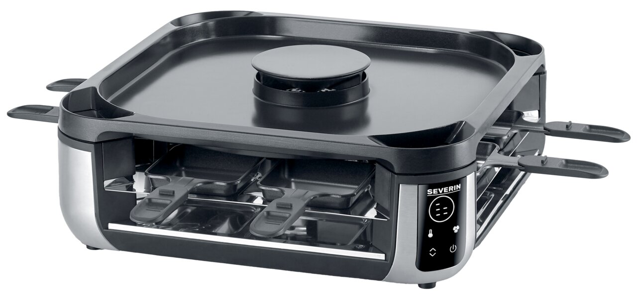 Smokeless Raclette-Grill in schräger Perspektive mit mehreren Pfännchen und digitalem Bedienfeld.