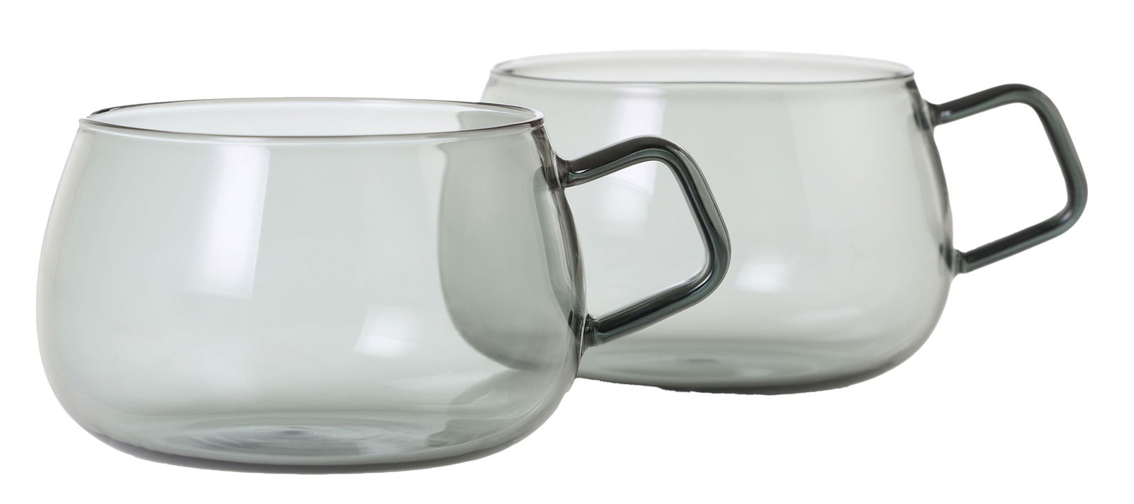 Zwei transparente Tassen mit Henkel aus Glas, seitliche Perspektive