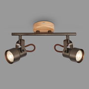 Zweiflammige Spotleuchte mit modernem Design, Metall in dunklem Finish und Holzdetails, seitliche Perspektive.