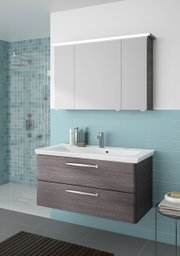 Moderner Badblock mit Waschbecken und Unterschrank in Holzoptik, frontal betrachtet, vor einer Wand mit blauen Fliesen.
