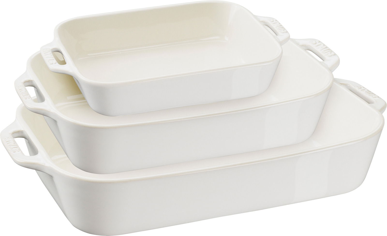 Dreiteiliges Set von weißen Auflaufformen, gestapelt in schräger Perspektive