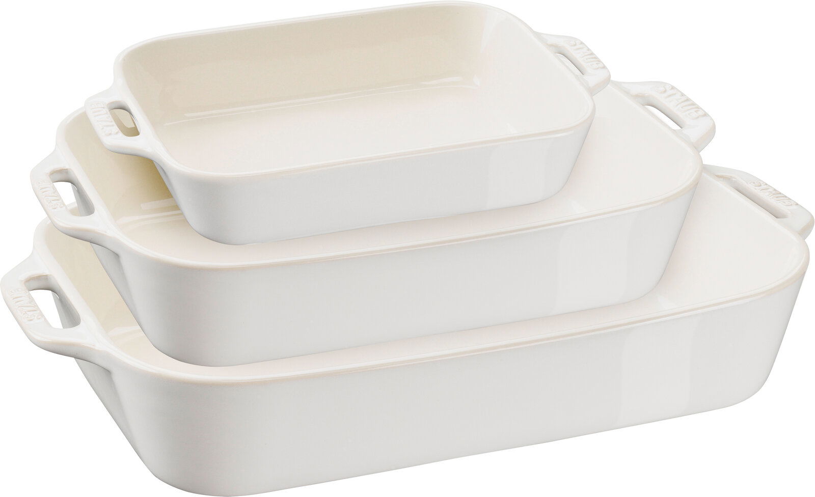 Dreiteiliges Set von weißen Auflaufformen, gestapelt in schräger Perspektive