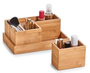 Organizer-Set aus Bambus, 4-teilig, mit verschiedenen Fächern für Kosmetikartikel, aus seitlicher Perspektive fotografiert.